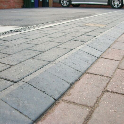 Brett Paving_Concrete 'Mobility Kerb' Charcoal-BLOCK PAVING KERBS