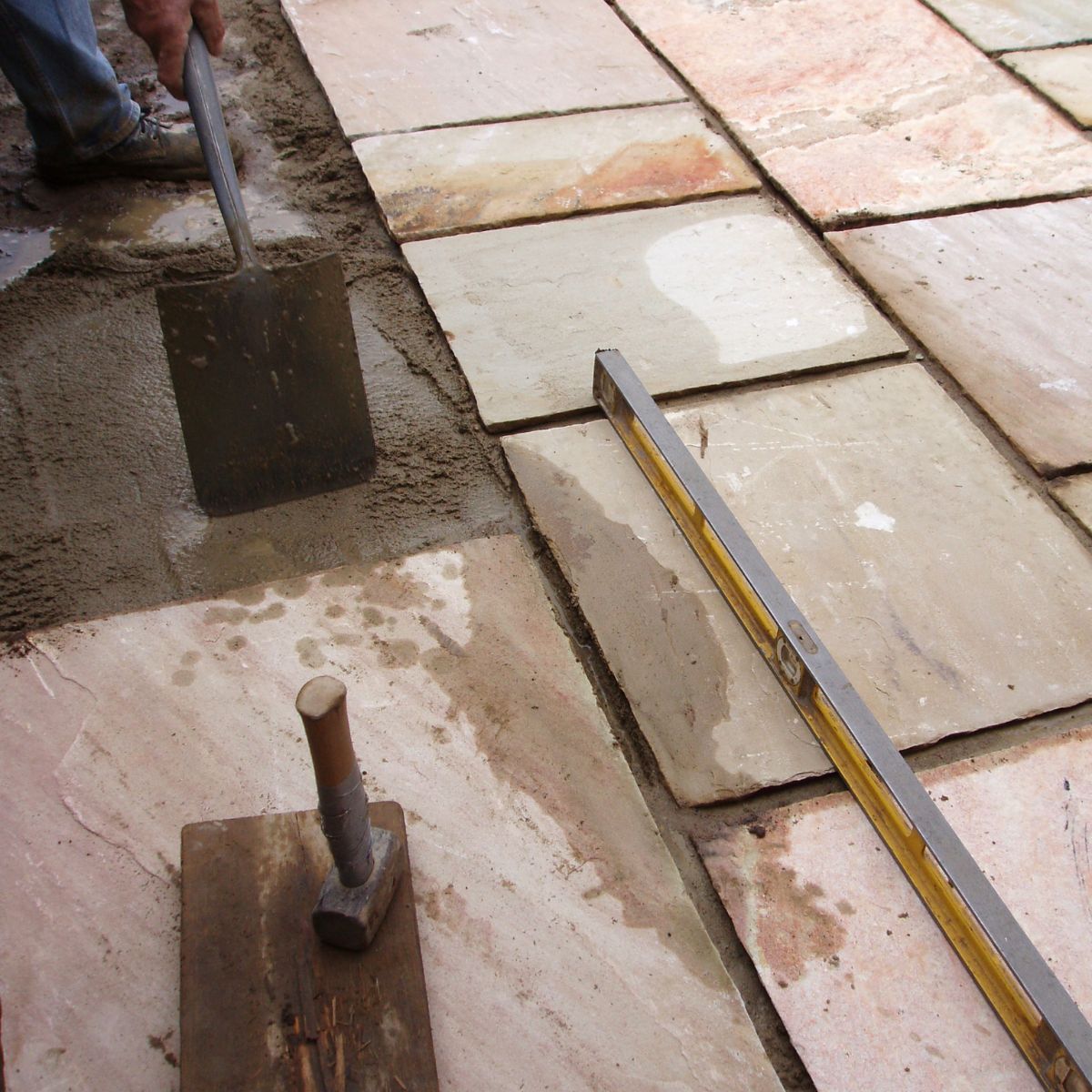 How to Lay Paving Slabs on Concrete (Guide)